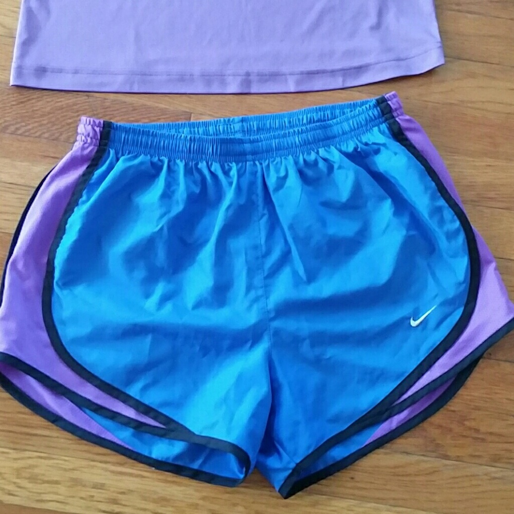 Blue Nike running shorts
